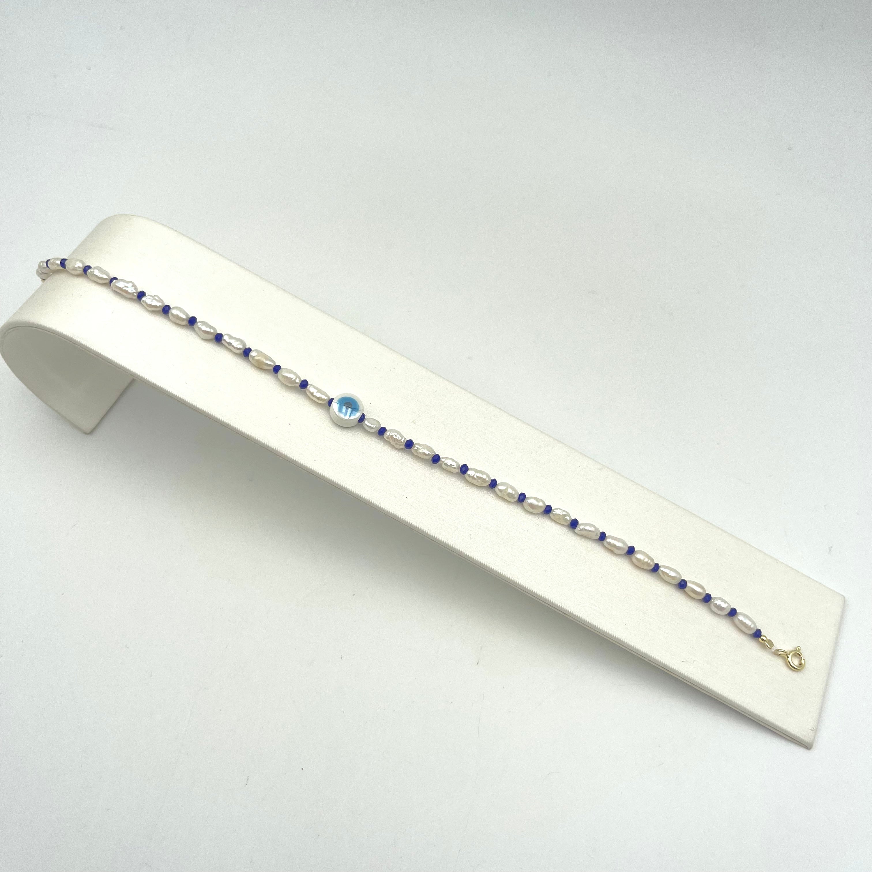 CAVIGLIERA OCCHIO E PERLE DI FIUME.