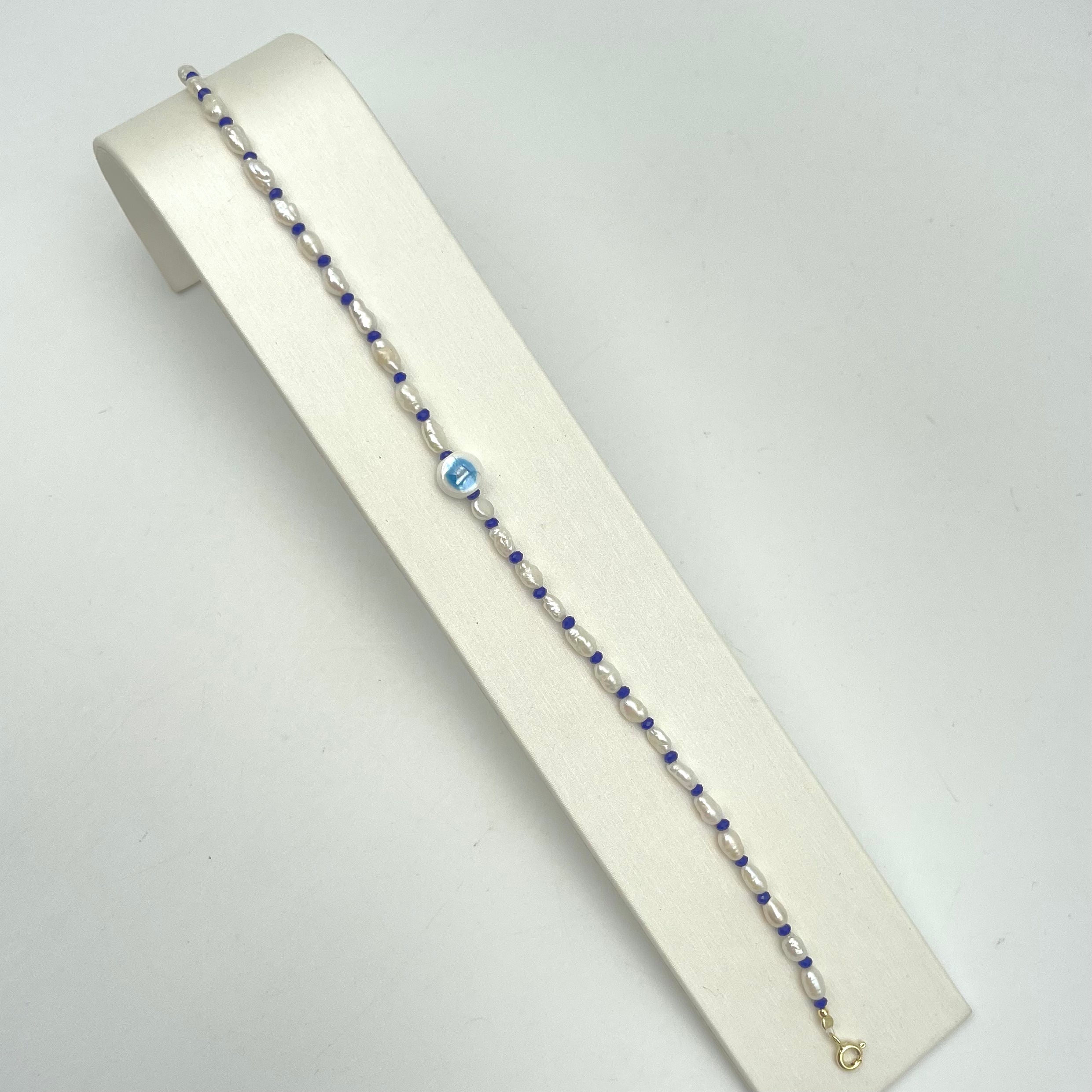 CAVIGLIERA OCCHIO E PERLE DI FIUME.